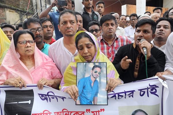 A human chain in front of the Chattogram Press Club on 20 June demanding justice over the murder of a youth, Anik. Anik`s parents also joined the human chain with his picture. The photo was taken from Chattogram by Sowrav Das on 20 June