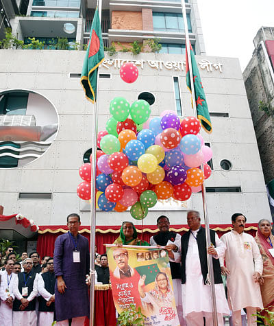 Awami League president and prime minister Sheikh Hasina inaugurates her party’s new office building at Bangabandhu Avenue in the capital on Saturday. Photo: BSS