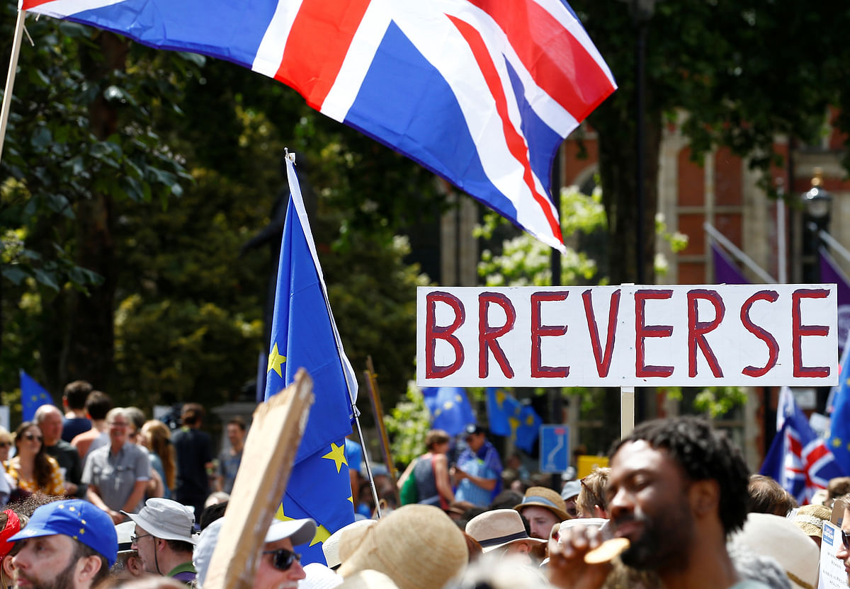 A placard is displayed as EU supporters, calling on the government to give Britons a vote on the final Brexit deal, participate in the `People`s Vote` march in central London, Britain on 23 June 2018. Photo: Reuters
