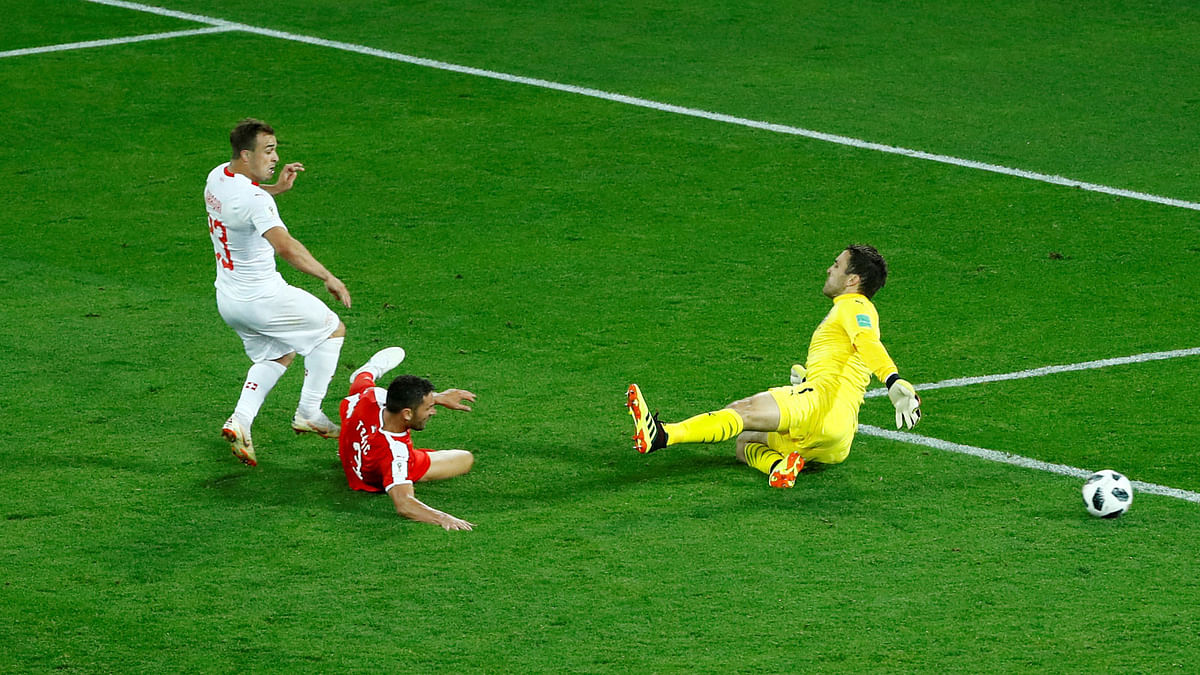 Switzerland`s Xherdan Shaqiri scores their second goal against Serbia. Photo: Reuters