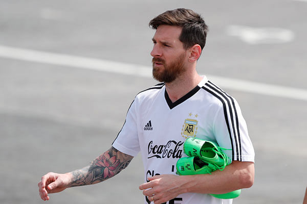 Lionel Messi arrives for a training session of Argentina at the 2018 soccer World Cup in Bronnitsy, Russia, Sunday, 24 June 2018