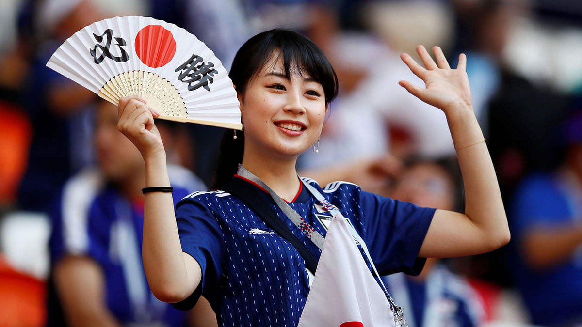 A Japan fan during their match against Colombia on 19 June. Photo: Reuters