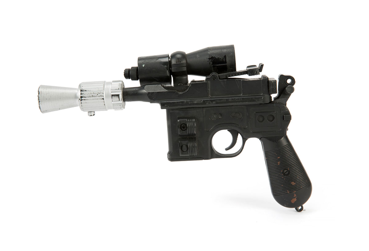 This photo provided by Julien`s Auctions shows character Han Solo`s BlasTech DL-44 blaster from the Star Wars trilogy film `Return of the Jedi` (Lucasfilm, 1983) that sold for $550,000 at Julien`s Auctions Hollywood Legends auction at Planet Hollywood Resort & Casino, in Las Vegas, on 23 June. Photo: AP