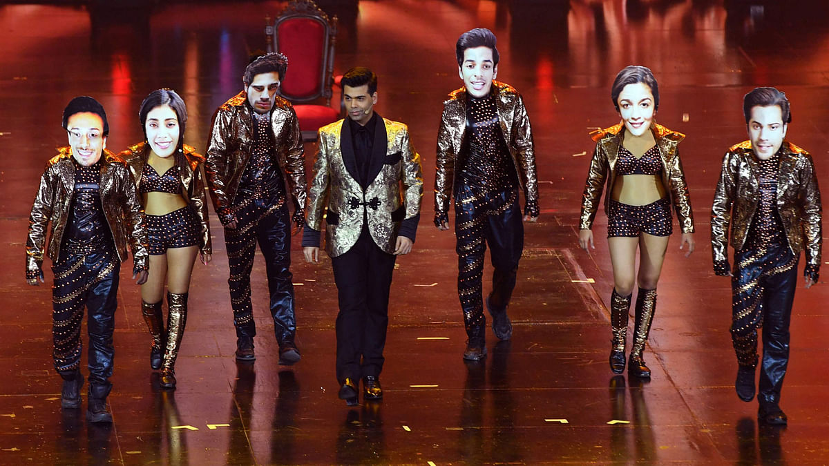ollywood director/producer Karan Johar (4th-L) performs during the IIFA Awards of the 19th International Indian Film Academy (IIFA) festival at the Siam Niramit Theatre in Bangkok on 24 June 2018. Photo: AFP