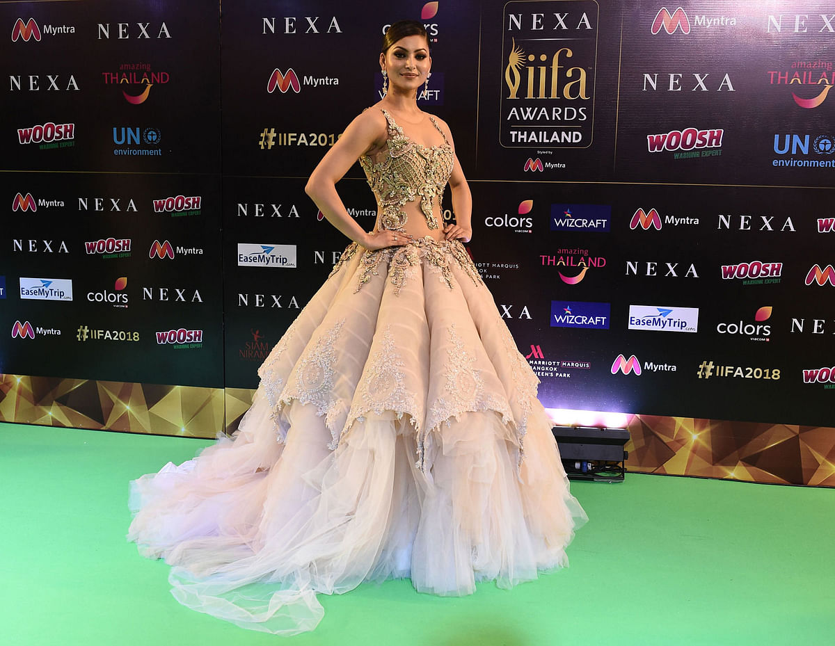 Bollywood actress Urvashi Rautela arrives for the IIFA Awards of the 19th International Indian Film Academy (IIFA) festival at the Siam Niramit Theatre in Bangkok on 24 June 2018. Photo: AFP