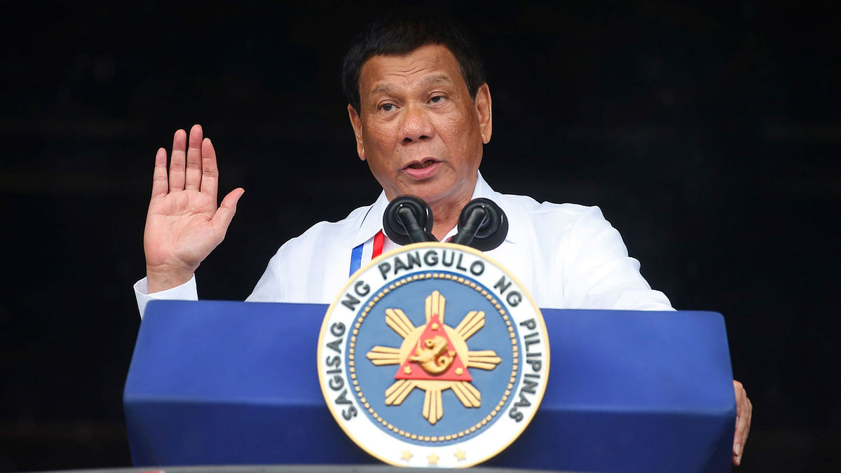 In this Tuesday, 11 June 2018, file photo, Philippine president Rodrigo Duterte gestures while addressing the crowd at the 120th Philippine Independence Day celebrations south of Manila, Philippines. President Duterte, notorious for having insulted the pope and former US president Barack Obama, has sparked outrage for calling God `stupid` in Asia`s bastion of Catholicism. Photo : AP
