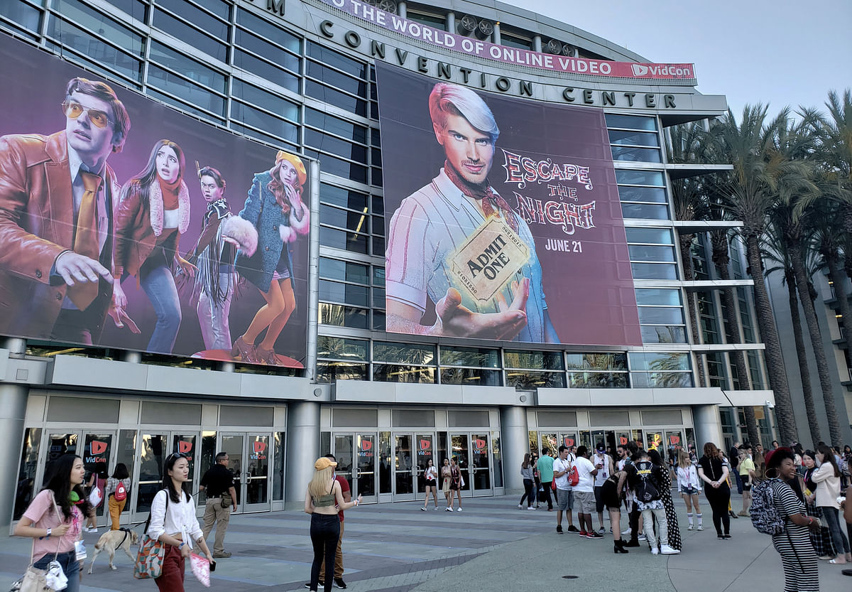 Posters hang outside the Anaheim Convention Center highlighting the new season of Escape the Night, a show on YouTube, in Anaheim, California, US 23 June. Photo: Reuters
