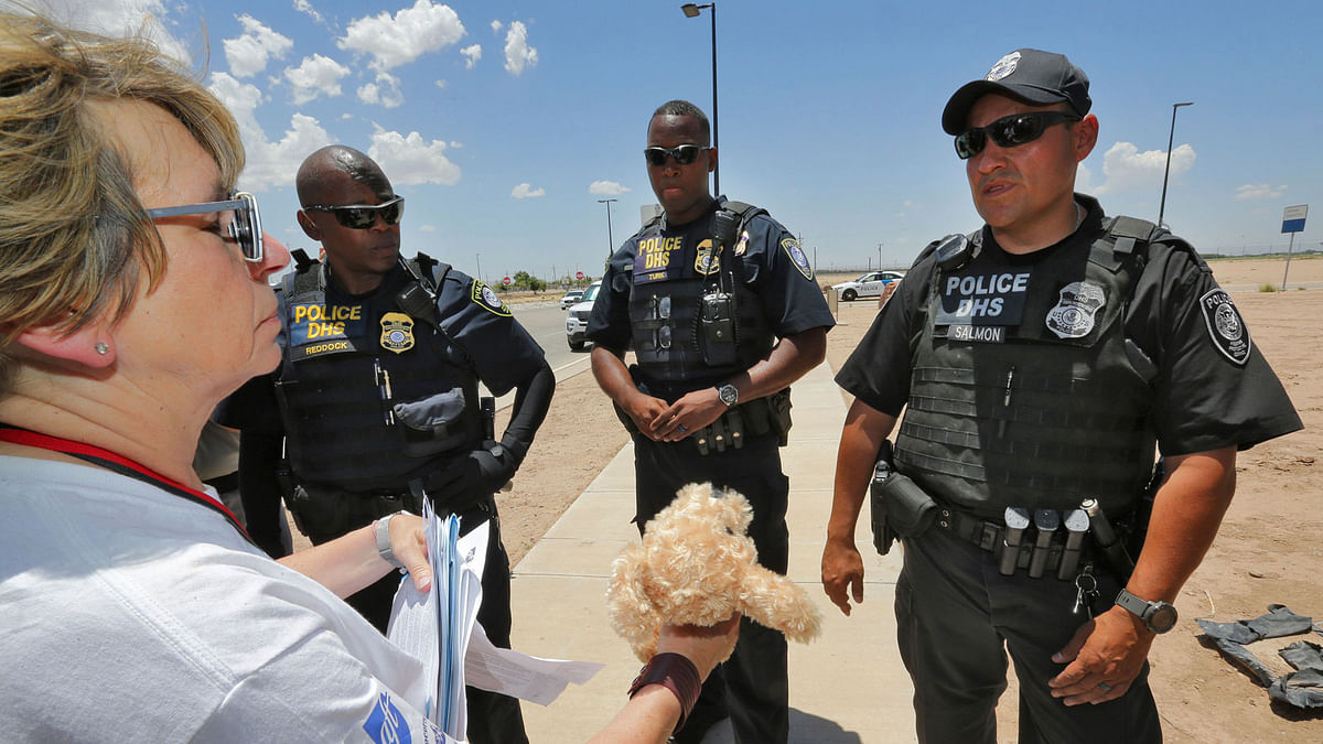 Randi Weingarten tries to deliver a teddy bear and other items for children to federal agents at the port-of-entry, Tuesday on 26 June 2018, in Fabens, Texas, along the international border where immigrant children are being held. The group tried to deliver items to the children housed in tents at the facility but were turned away. Photo: AP