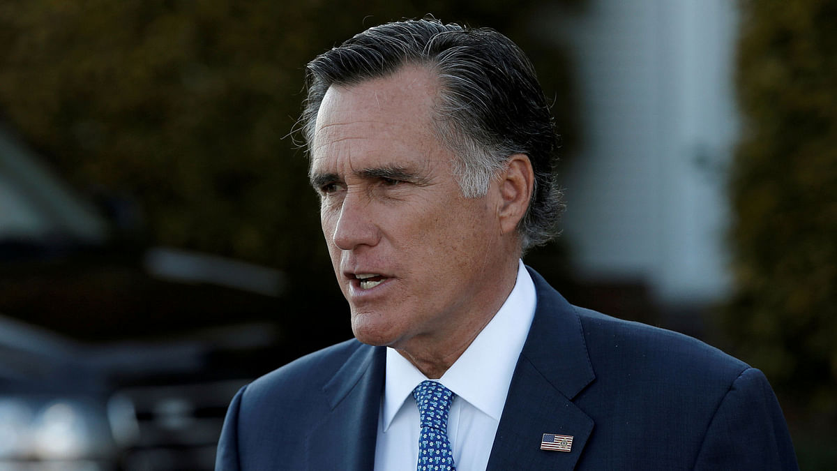 Former Massachusetts Governor Romney speaks to members of the media at Trump National Golf Club in Bedminster, US.