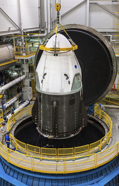 This NASA photo released 25 June 2018 shows SpaceX’s Crew Dragon at NASA’s Plum Brook Station in Ohio, undergoing testing in the In-Space Propulsion Facility-the world’s only facility capable of testing full-scale upper-stage launch vehicles and rocket engines under simulated high-altitude conditions. The chamber will allow SpaceX and NASA to verify Crew Dragon’s ability to withstand the extreme temperatures and vacuum of space. Photo: AFP