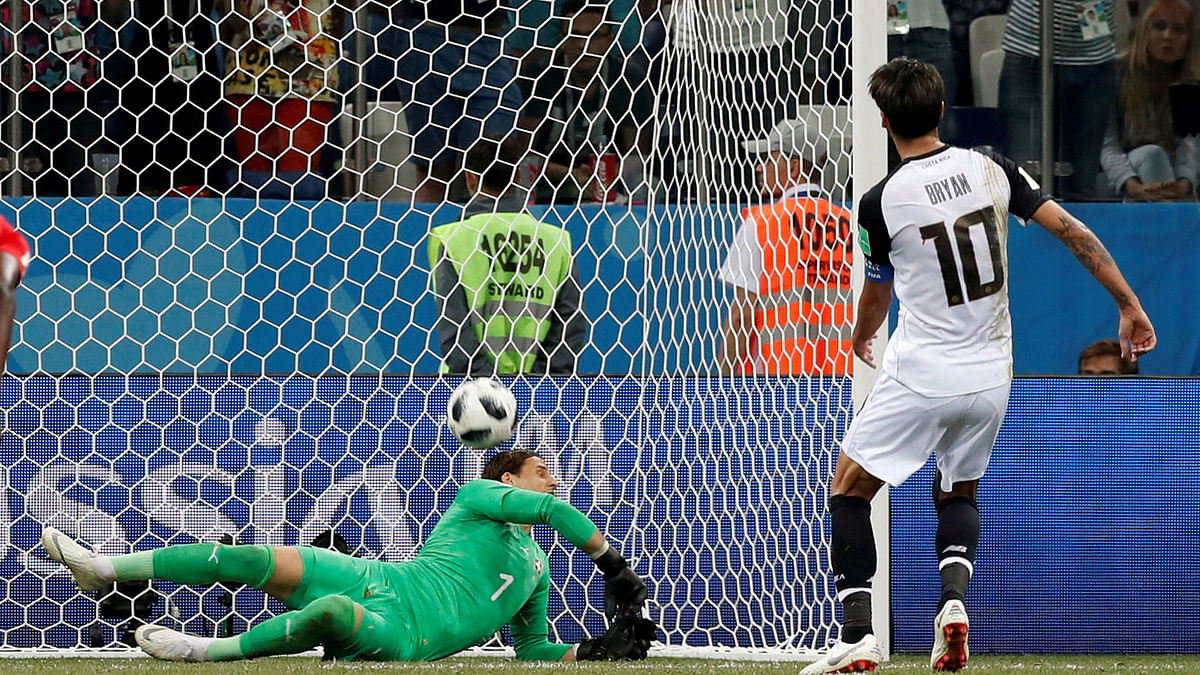 Switzerland`s Yann Sommer scores an own goal and the second goal for Costa Rica after Costa Rica`s Bryan Ruiz shot at goal from the penalty spot. Photo: Reuters