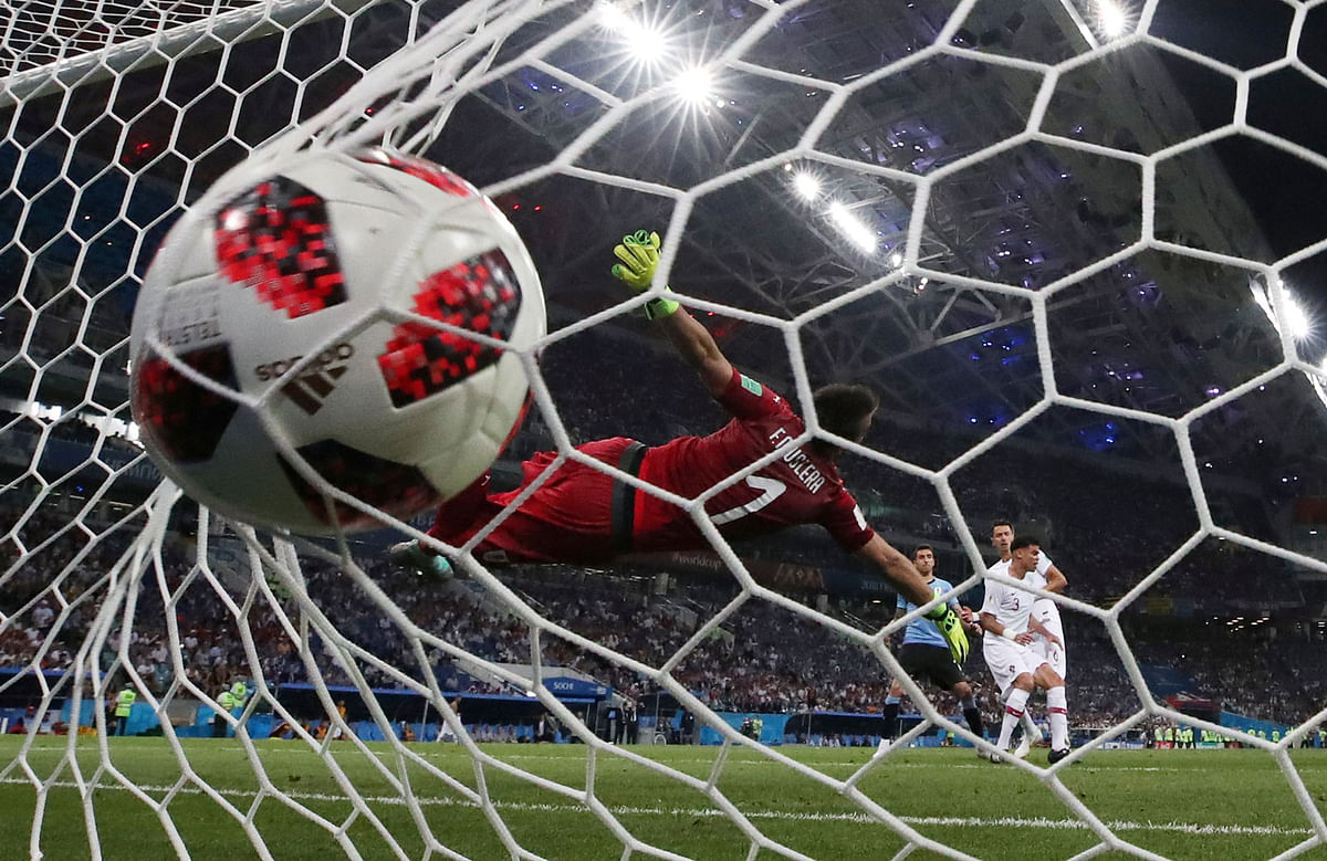 Portugal`s Pepe scores their first goal in the Round of 16 match against Uruguay at Fisht Stadium, Sochi, Russia on 30 June 2018. Photo: Reuters
