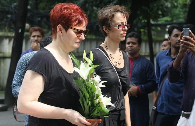 Employees of foriegn embassies also pay respect to the victims of Holey Artisan Bakery on Sunday in capital`s Gulshan-2. Photo: Abdus Salam