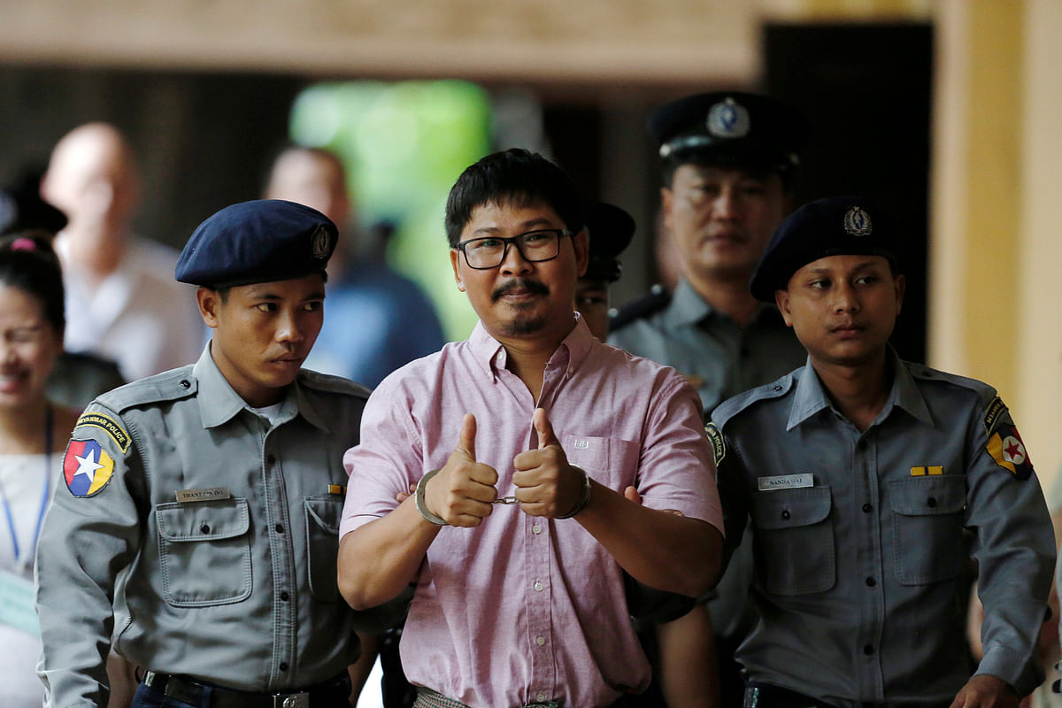 Detained Reuters journalist Wa Lone arrives at Insein court in Yangon, Myanmar on 2 July. Photo: Reuters
