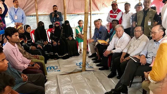 UN secretary general Antonio Guterres World Bank Group president Jim Yong Kim and foreign minister AH Mahmood Ali at a Rohingya camp in Cox`s Bazar on Monday. Photo: Prothom Alo