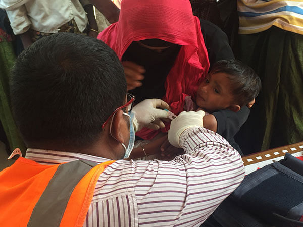 An infant being treated at the HAEFA health centre in the refugee camp