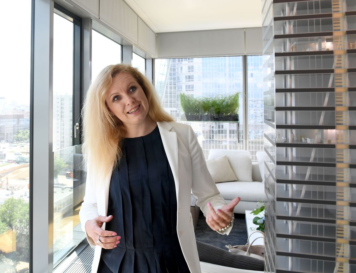 Karolina Kaim, president of Tacit Investment, the Polish firm that financed the construction of the 44-floor Cosmopolitan apartment tower in the heart of Warsaw, answers journalists` questions on 15 June 2018 at the building`s 44th floor. Many of the elite live in the 44-floor Cosmopolitan apartment tower right in the heart of Warsaw.AFP