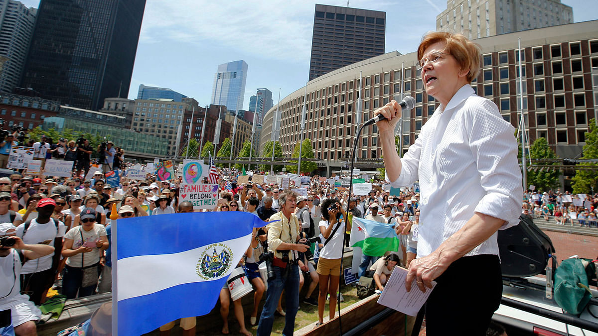 In this 30 June 2018, file photo, Sen Elizabeth Warren, D-Mass, speaks during a rally against separation in Boston. The White House is using its official Twitter handle to target Democratic lawmakers who have criticised president Donald Trump`s immigration policies, drawing complaints that government resources are being used to undercut potential 2020 rivals. The White House handle falsely accused California Sen Kamala Harris on Monday of `supporting the animals of MS-13` and erroneously said Warren was `supporting criminals moving weapons, drugs, and victims` over the border. Photo : AP