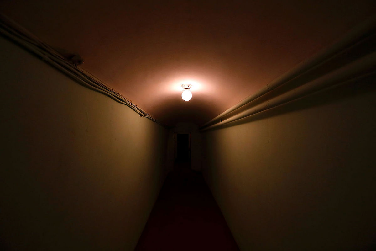 A lamp illuminates a corridor inside Stalin`s Bunker, a bunker complex built in 1942 as an alternative headquarters for the Soviet Union leader Joseph Stalin, in Samara, Russia, 4 July 2018. Photo: Reuters