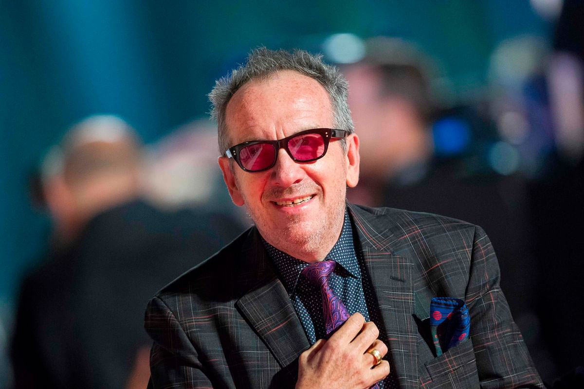n this file photo taken on 12 September 2017, Elvis Costello arrives for the premiere of `Film Stars Don`t Die in Liverpool` at the Toronto International Film Festival in Toronto. Photo: AFP