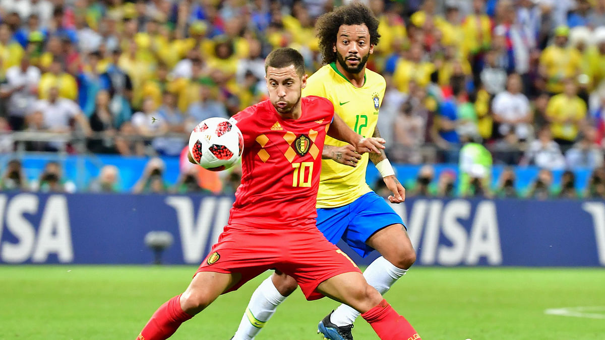 Belgium`s forward Eden Hazard (L) vies for the ball with Brazil`s defender Marcelo during the Russia 2018 World Cup quarter-final football match between Brazil and Belgium at the Kazan Arena in Kazan on 6 July 2018. Photo: AFP