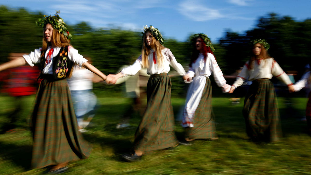 Belarusian women take part in the Ivan Kupala festival in Belarusian state museum of folk architecture and rural lifestyle near the village Aziarco, Belarus on 7 July 2018. Photo: Reuters