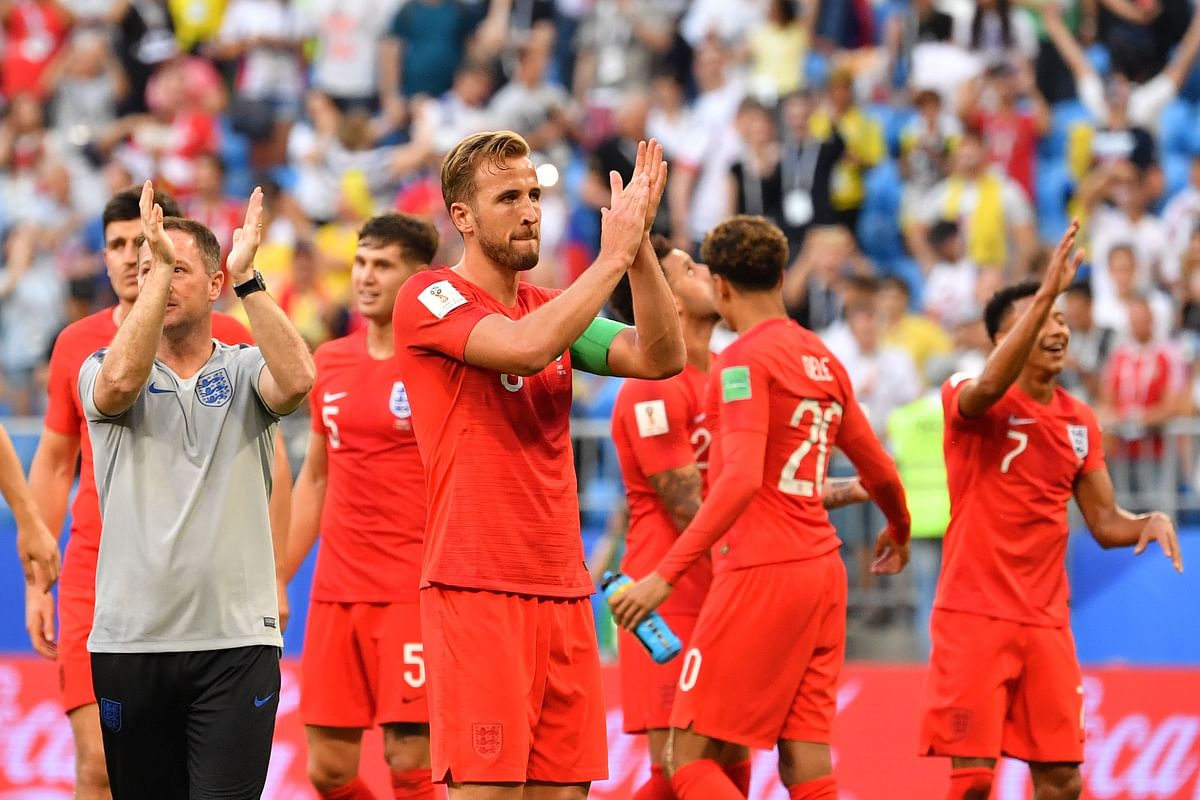 England`s forward Harry Kane (C) applauds at the end of the Russia 2018 World Cup quarter-final football match between Sweden and England at the Samara Arena in Samara on 7 July 2018. Photo: AFP