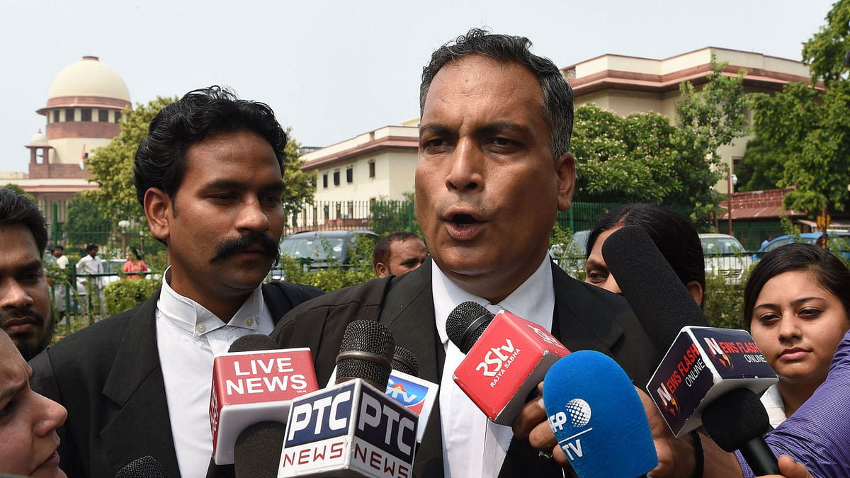 Indian defence lawyer AP Singh representing men accused of gang-raping and murdering a woman in 2012 talks to the media outside India’s supreme court building in New Delhi on 9 July. Photo: AFP