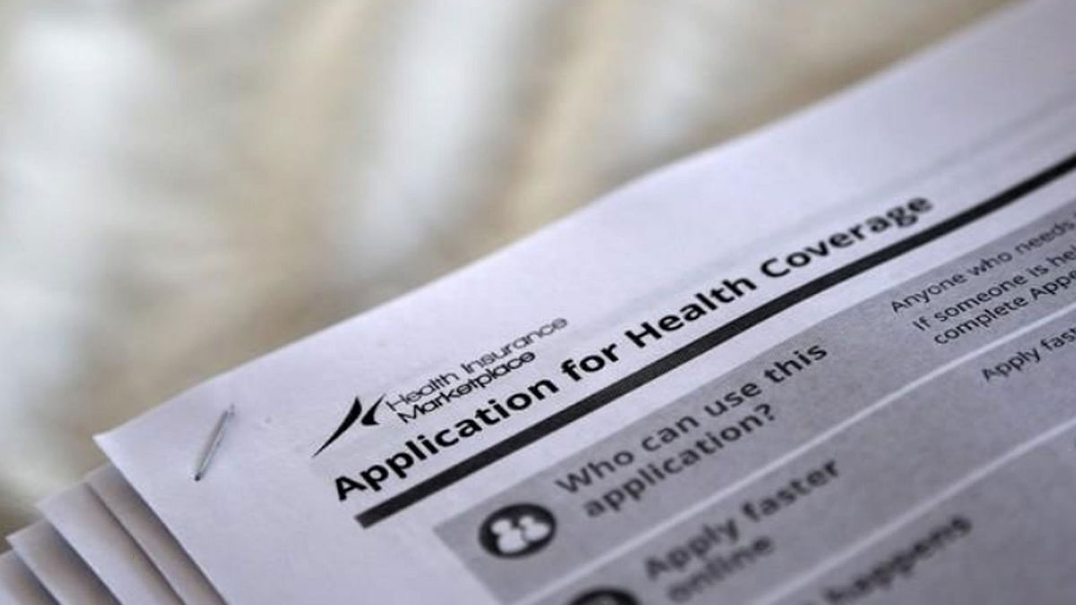 The US federal government forms for applying for health coverage are seen at a rally held by supporters of the Affordable Care Act, widely referred to as `Obamacare`, outside the Jackson-Hinds Comprehensive Health Center in Jackson, Mississippi, on 4 October 2013. -- Reuters
