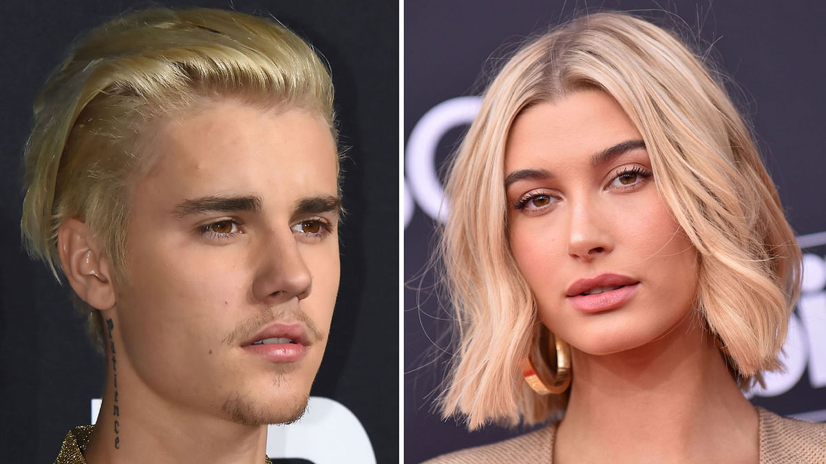 These two file photos show singer Justin Bieber (L) on 10 February, 2016 attending the Yves Saint Laurent men`s fall line at the Hollywood Palladium in Hollywood, California; and TV personality-model Hailey Baldwin (R) on 20 May, 2018 at the 2018 Billboard Music Awards at the MGM Grand Resort International in Las Vegas, Nevada. Photo: AFP