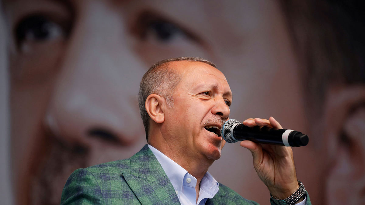 Turkish president Tayyip Erdogan addresses his supporters during an election rally in Istanbul, Turkey on 23 June 2018. Photo: Reuters