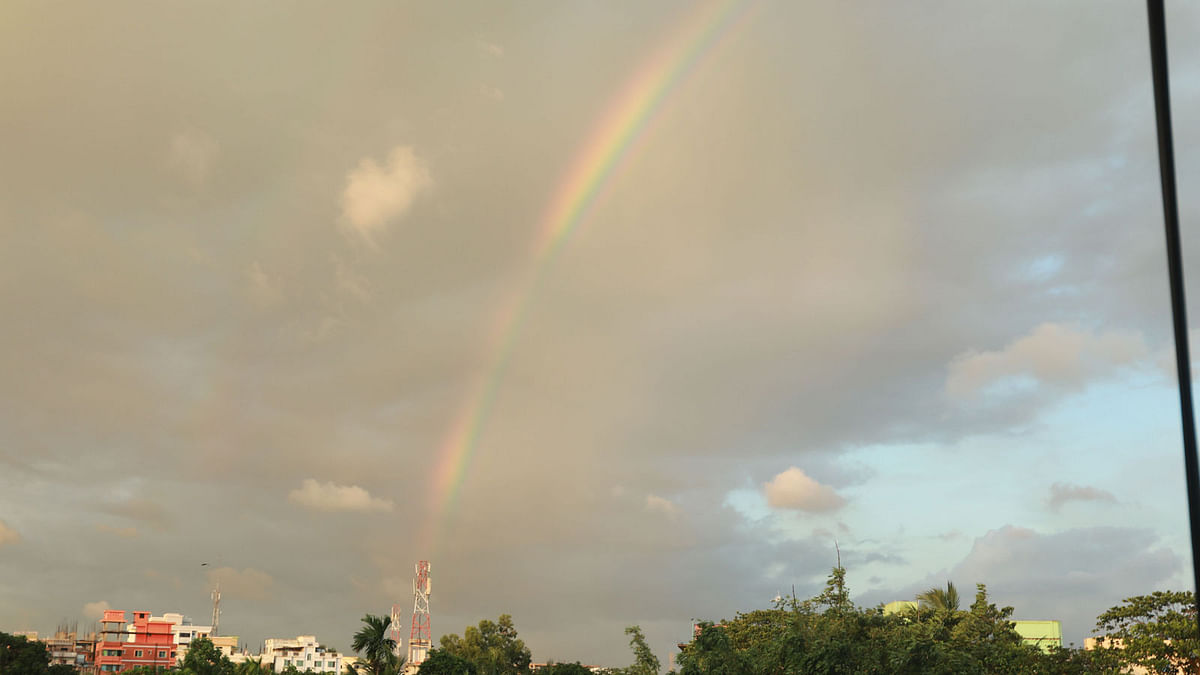 A rainbow forms in the sky. Jewel Shil takes this photo from Uttar Kattoli area of Chattogram city on 8 July.