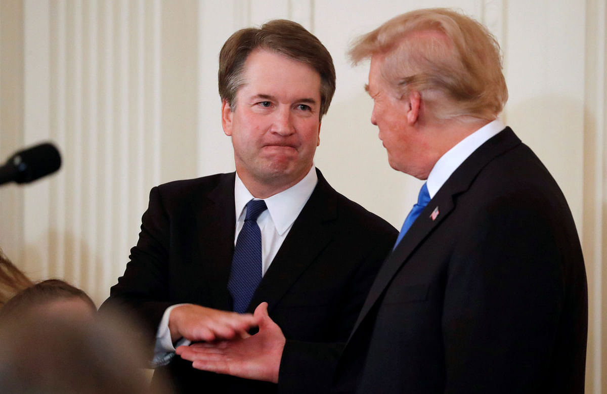 Supreme Court nominee Judge Brett Kavanaugh shakes hands with US president Donald Trump in the East Room of the White House in Washington, US on 9 July 2018. Photo: Reuters