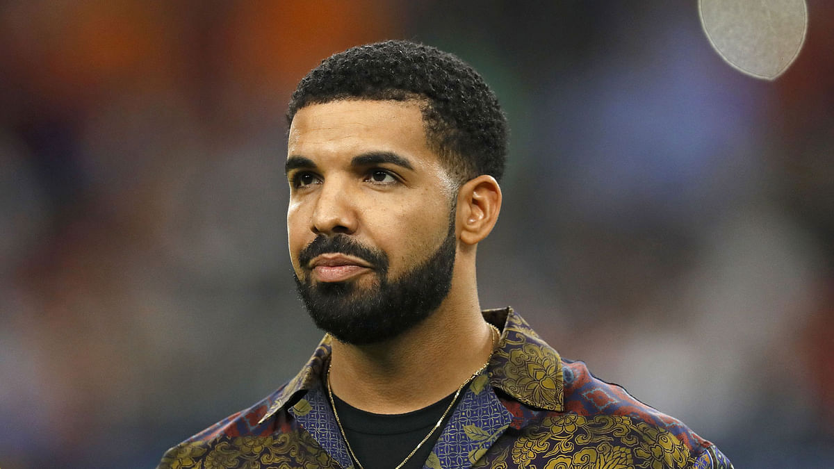 In this file photo taken on 20 July, 2017 rapper Drake looks on prior to the International Champions Cup soccer match between Manchester City against Manchester United at NRG Stadium in Houston, Texas. Photo: AFP
