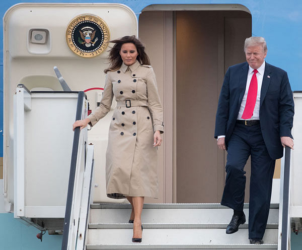 US president Donald Trump (R) and US First Lady Melania Trump disembark from Air Force One as they arrive at Melsbroek Air Base in Haachtsesteenweg on 10 July 2018. US president Donald Trump has arrived in Brussels on the eve of a tense NATO summit where he is set to clash with allies over defence spending. Photo: AFP