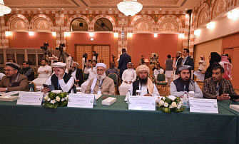 Mohammad Nabi Ayoubi, (2nd R), Peer Mohammad Rohani, (3rd R), Khalifa Naween, (3rd L) Dr. Abdul Shakoor Majoor, (2nd L) attend the international Ulema conference for peace and security in Afghanistan in Jeddah on 10 July 2018. Photo: AFP