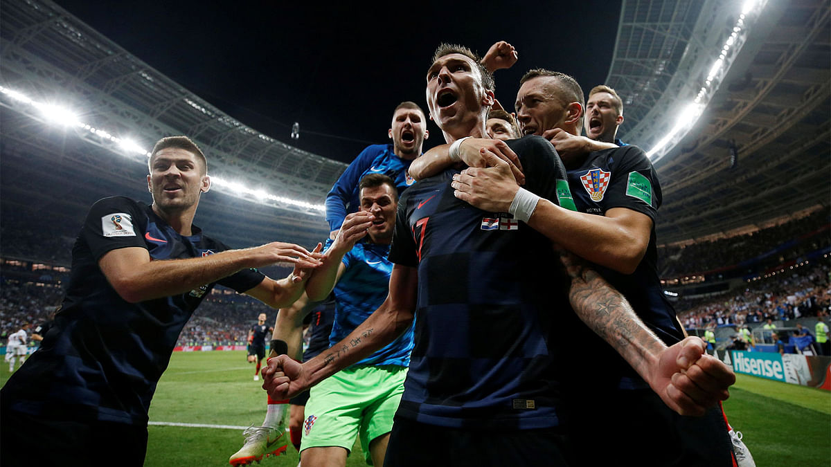Croatia`s Mario Mandzukic celebrates scoring their second goal with teammates. Photo: Reuters