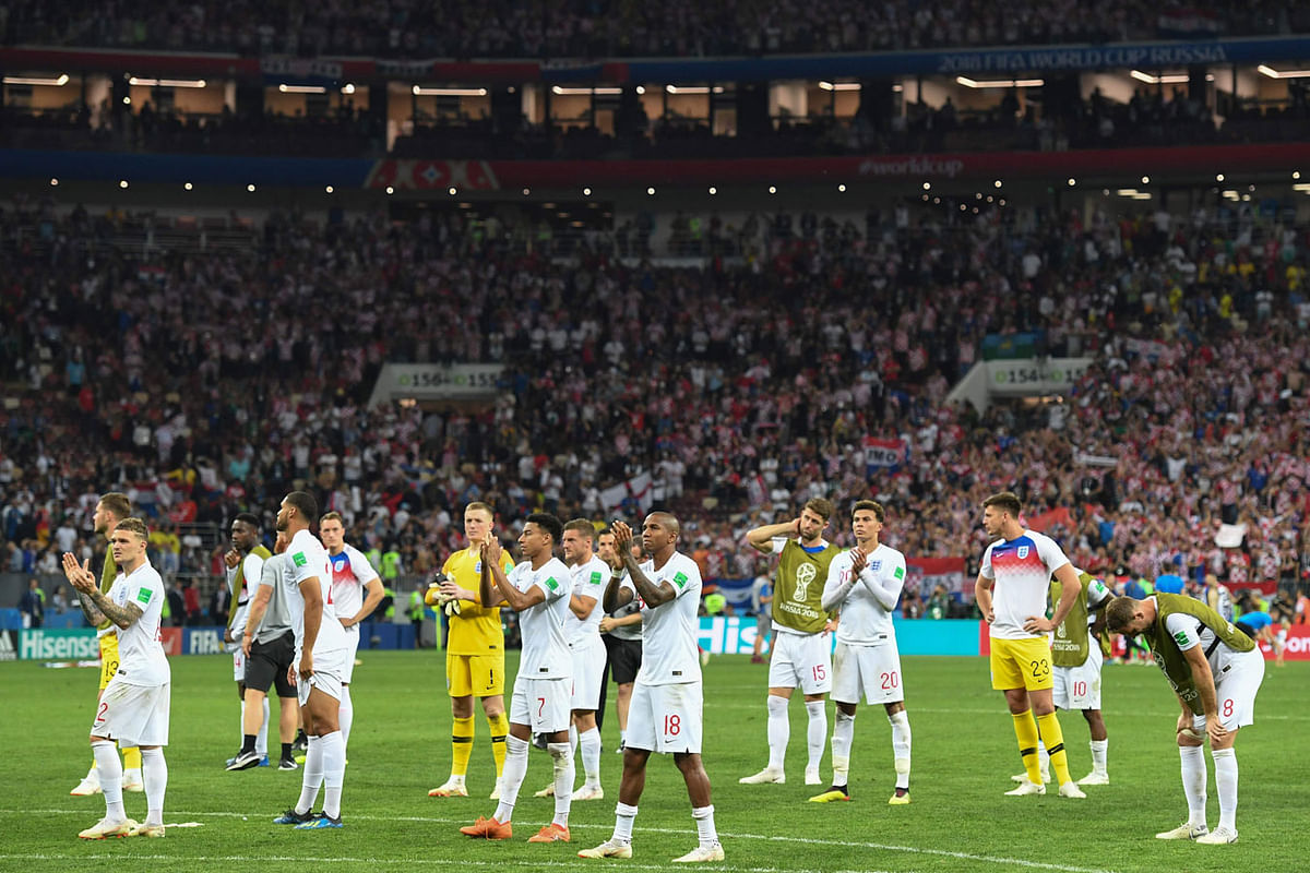 England players acknowledge fans at the end of their semifinal defeat to Croatia at the Luzhniki Stadium in Moscow on July 11, 2018. AFP