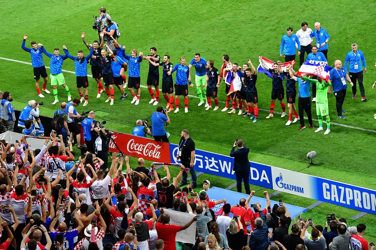 Croatia`s players celebrate after winning the Russia 2018 World Cup semi-final football match between Croatia and England at the Luzhniki Stadium in Moscow on July 11, 2018. AFP
