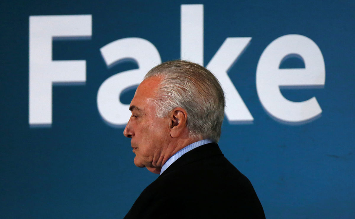 Brazil president Michel Temer leaves a seminar about fake news in Brasilia, Brazil on 20 June 2018. Photo: Reuters