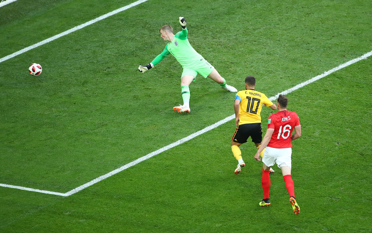 Belgium`s Eden Hazard scores their second goal past England`s Jordan Pickford against England at Saint Petersburg Stadium, Saint Petersburg, Russia on 14 July, 2018. Photo: Reuters