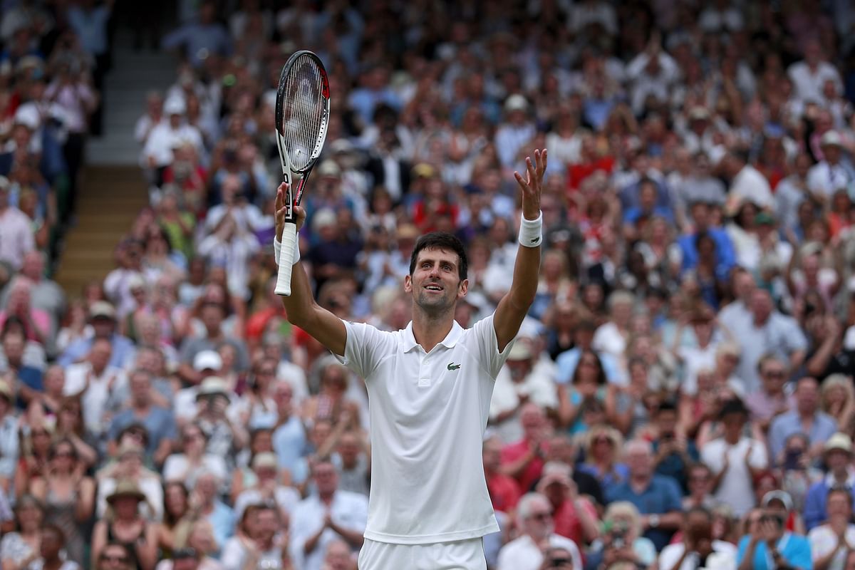 Serbia`s Novak Djokovic reacts after beating Spain`s Rafael Nadal in their men`s singles semi-final match on the twelfth day of the 2018 Wimbledon Championships at The All England Lawn Tennis Club in Wimbledon, southwest London, on 14 July, 2018. Photo: AFP
