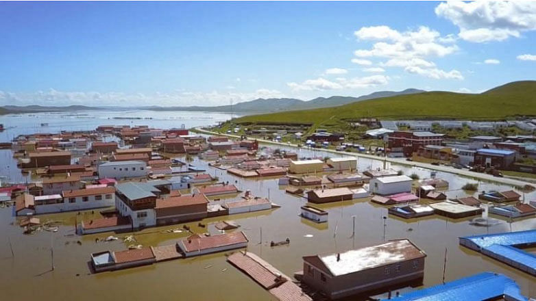 A flooded village is seen Zoige County, Sichuan, China on 13 July 2018 in this still image taken from a video obtained from social media on 14 July 2018. -- Reutetrs