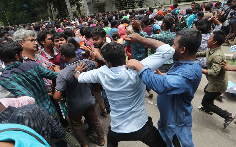 Bangladesh Chhatra League activists attack teachers and female students of Dhaka University on Sunday. Photo: Sajid Hossain