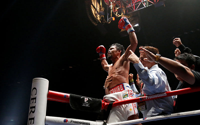 Boxing - WBA Welterweight Title Fight - Manny Pacquiao v Lucas Matthysse - Axiata Arena, Kuala Lumpur, Malaysia - 15 July 2018 Manny Pacquiao celebrates after defeating Lucas Matthysse. Photo: Reuters