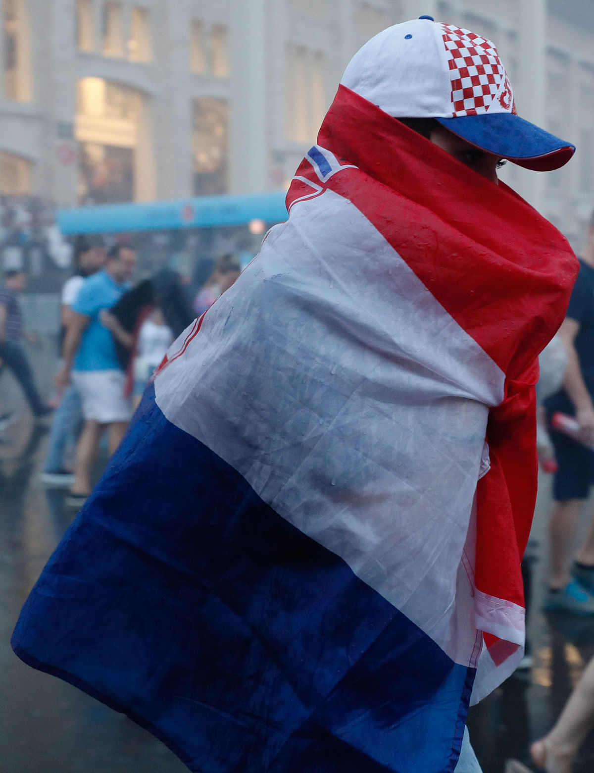 A supporter of team Croatia leaves the stadium after the game. Photo: Reuters