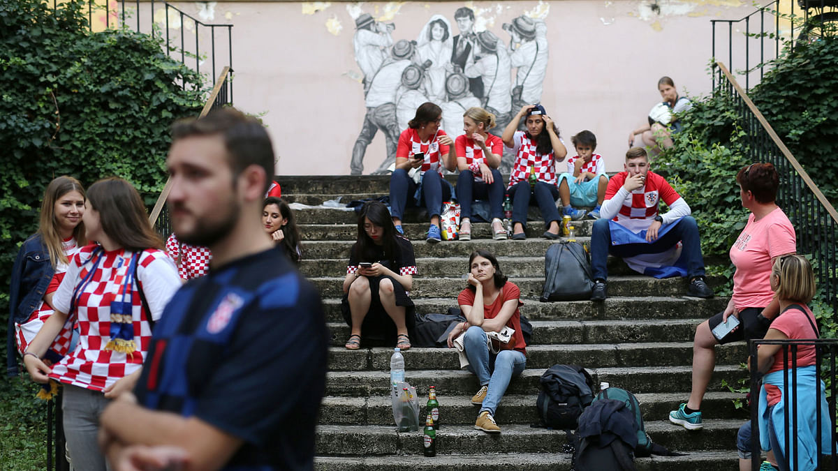 Croatia`s fans are seen after watching the broadcast of the match at the city`s main square. Photo: Reuters