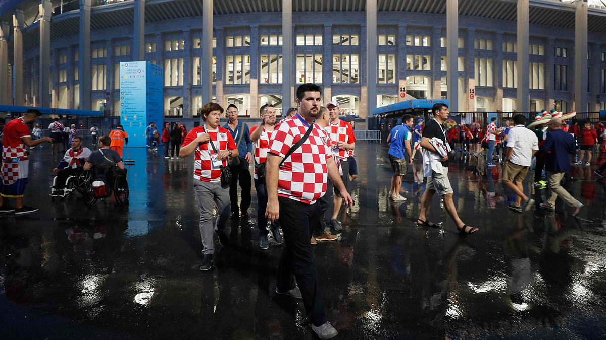 Supporters of team Croatia leaves the stadium after the game. REUTERS