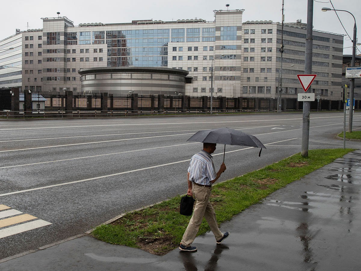 A man walks past the building of the Russian military intelligence service in Moscow, Russia on 14 July. Photo: AP