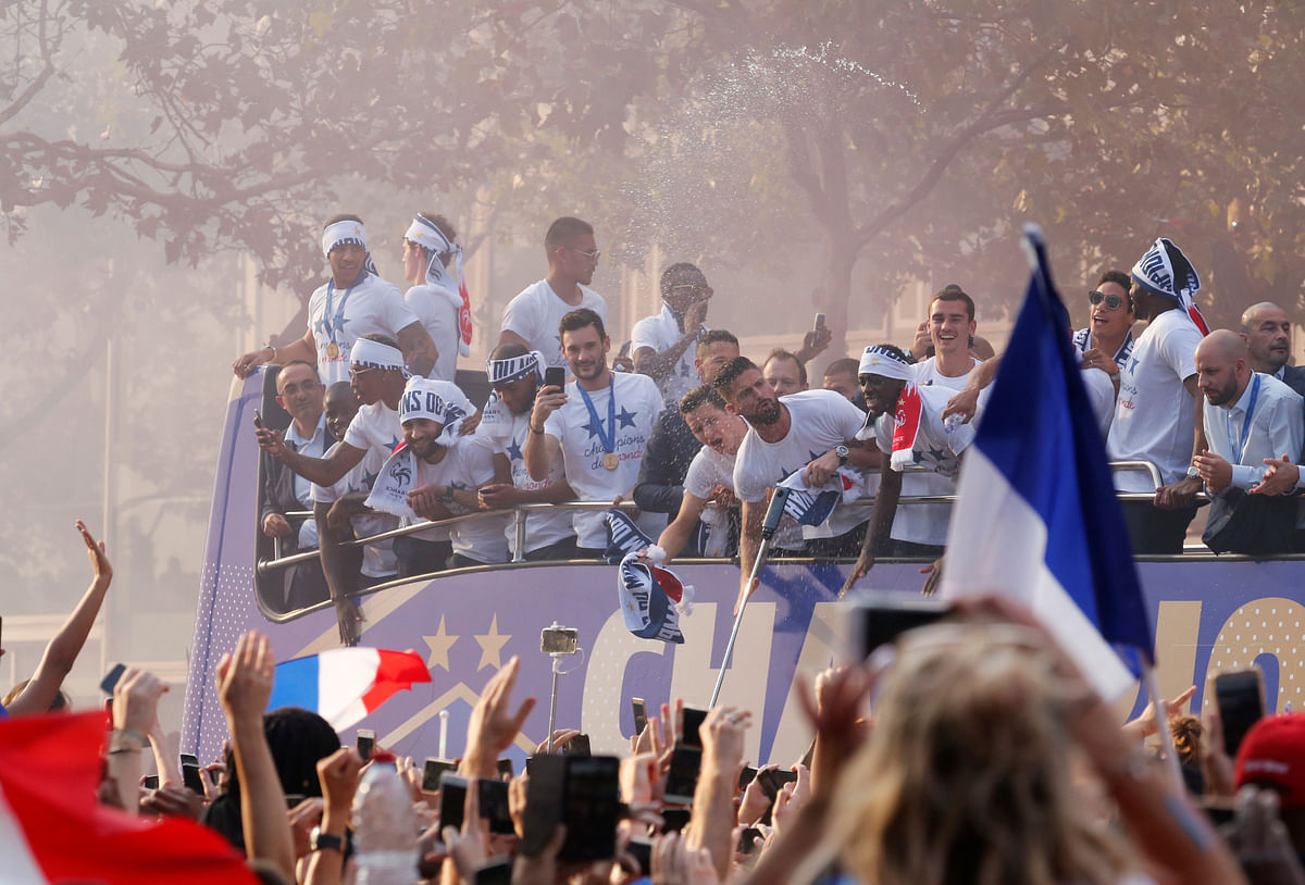 France team bus during the parade in Paris, France on 16 July. Photo: Reuters